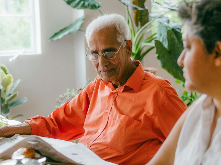 Senior couple meeting with a certified senior real estate specialist in Utah to plan their next move